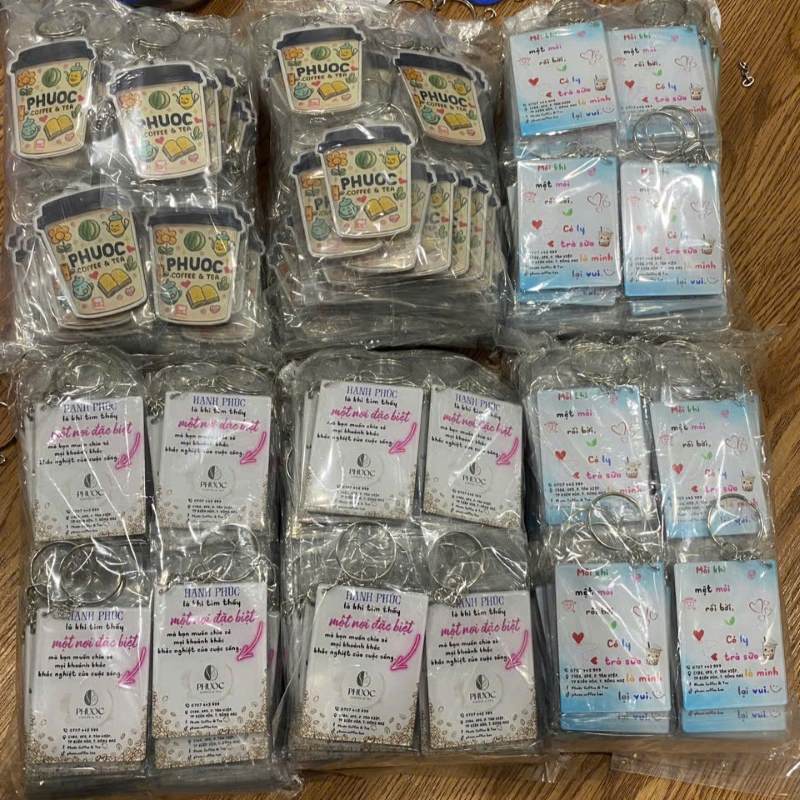 Móc khóa quà tặng in đa dạng,phía sau có thông điệp