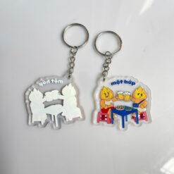 Móc khóa trong suốt hình nhân vật đang ăn uống