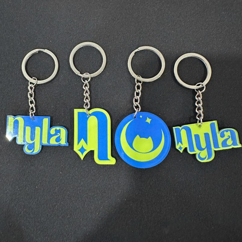 moc-khoa-nyla-1 Móc khóa mica in hình theo yêu cầu